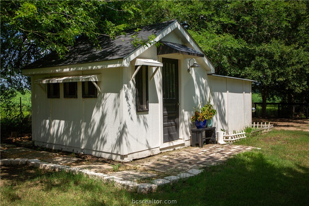 5036 Glory Road Bryan, TX 77808 - Photo 48 of 50 Tiny Cottage to the back of the property