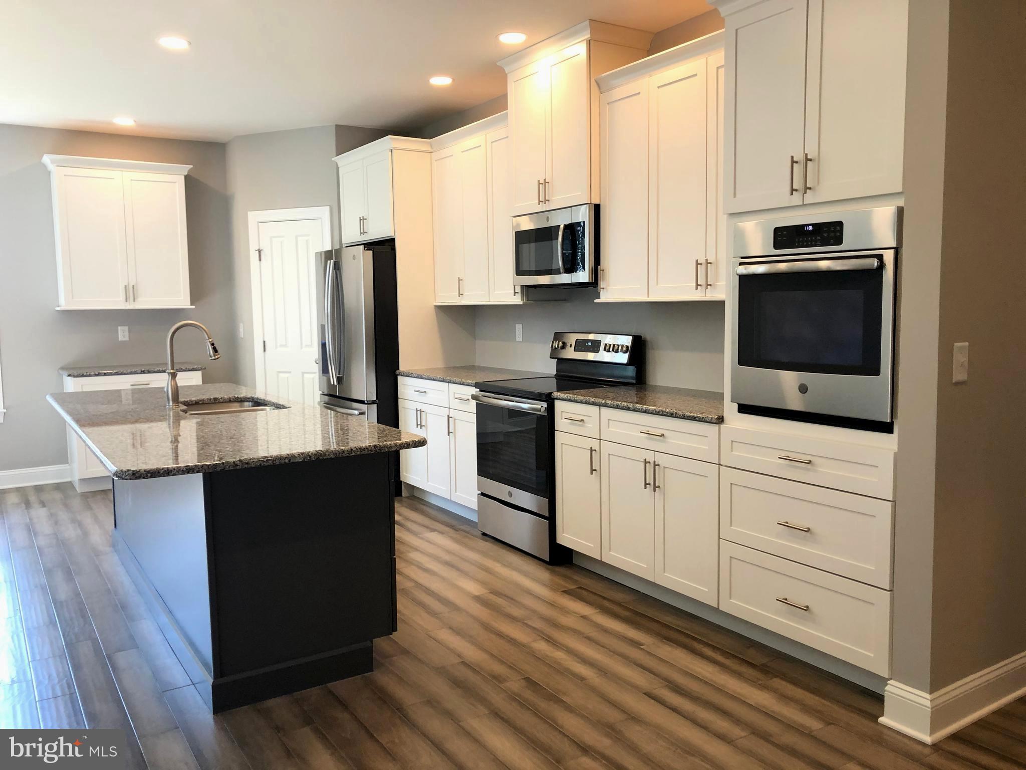 Custom Kitchen white cabinets and gray island
