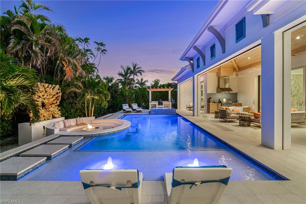 a view of a patio with swimming pool