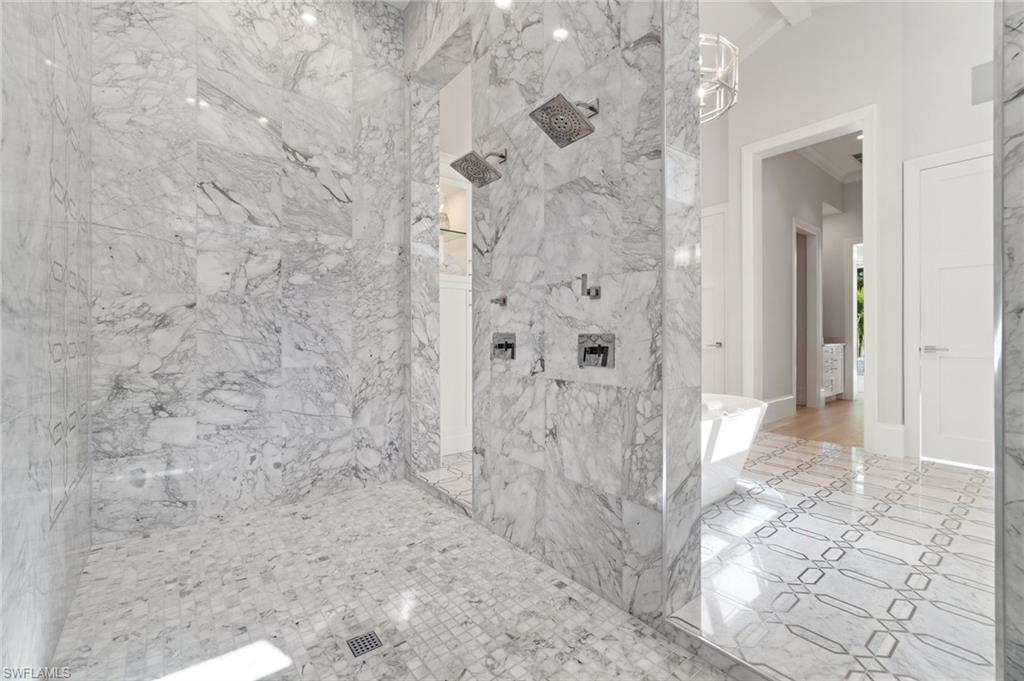 3290 Crayton Road Naples, FL 34103 - Photo 20 of 50 a bathroom with a shower