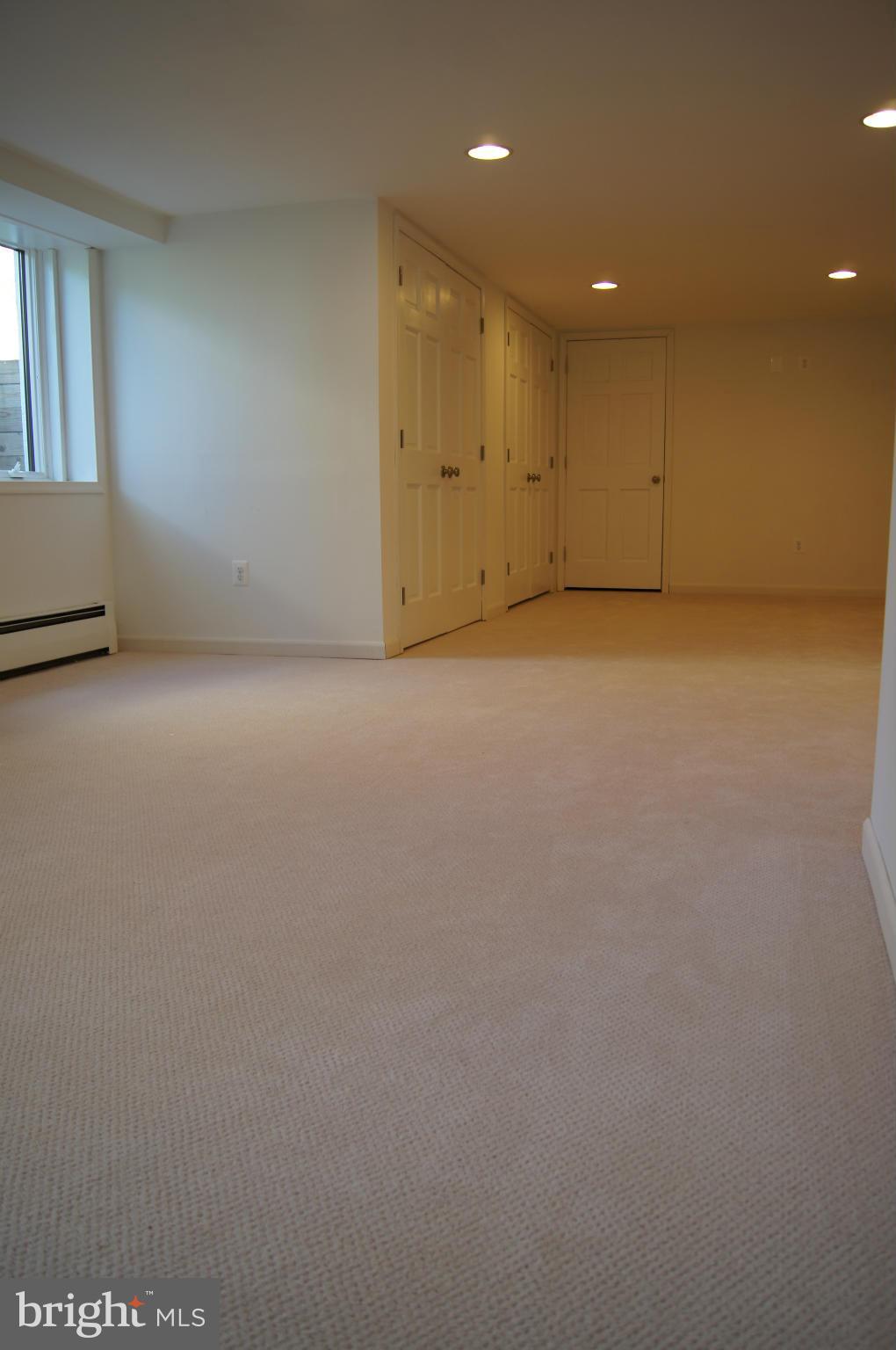 906 Rappaix Court Baltimore, MD 21286 - Photo 15 of 29 Newly finished. Plush carpet. Large windows.