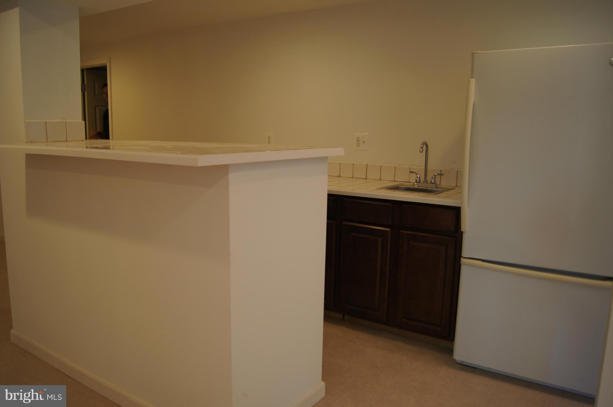 906 Rappaix Court Baltimore, MD 21286 - Photo 17 of 29 Great for entertaining. Bar area.