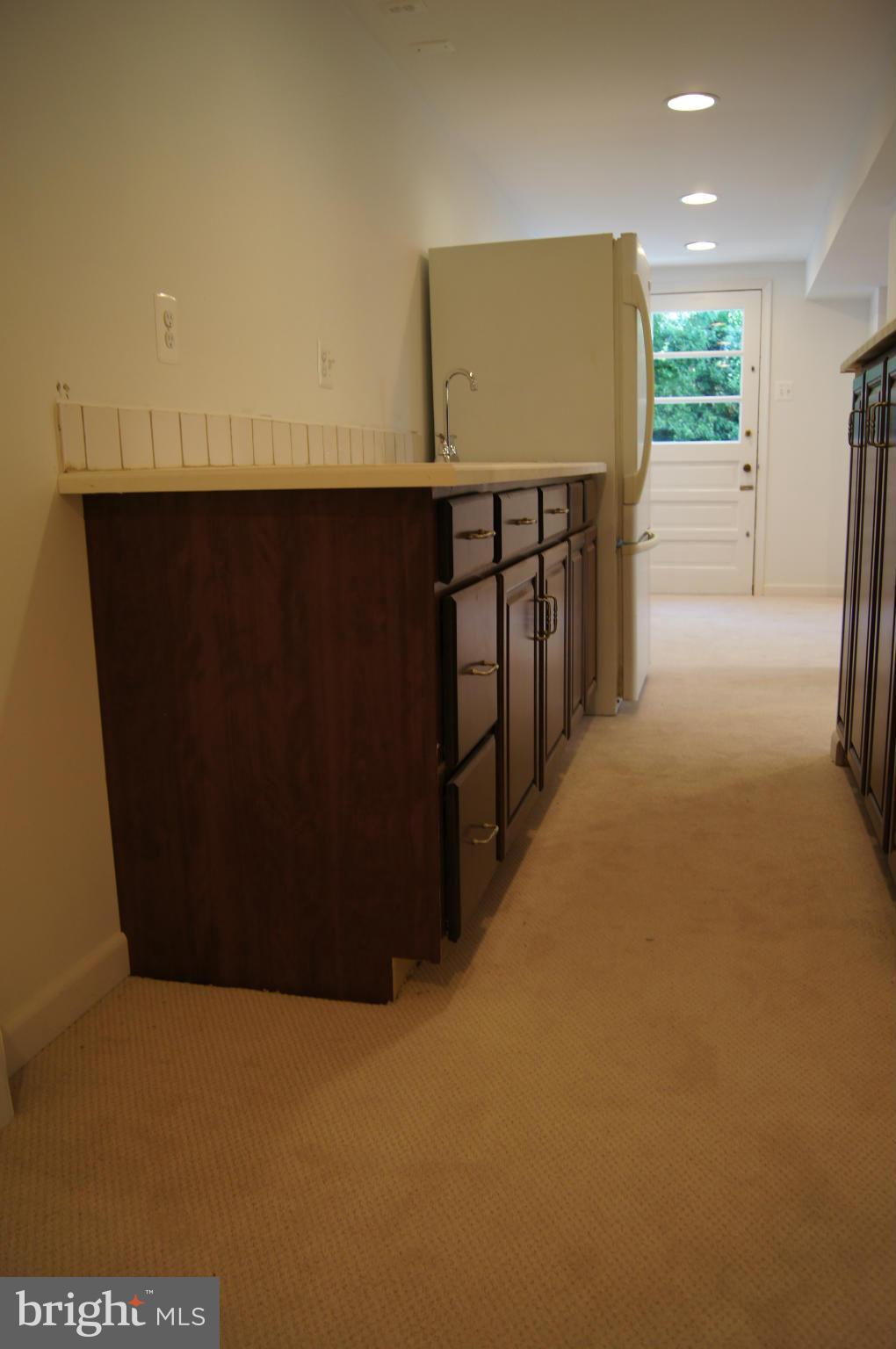 906 Rappaix Court Baltimore, MD 21286 - Photo 18 of 29 Full sized fridge in bar area.