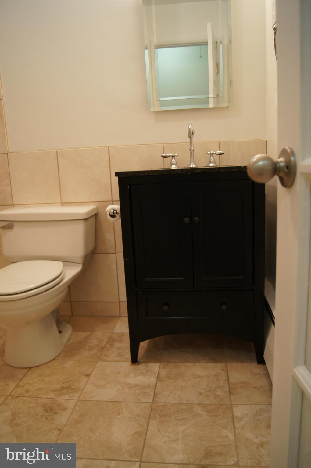 906 Rappaix Court Baltimore, MD 21286 - Photo 27 of 29 Renovated hall bathroom.