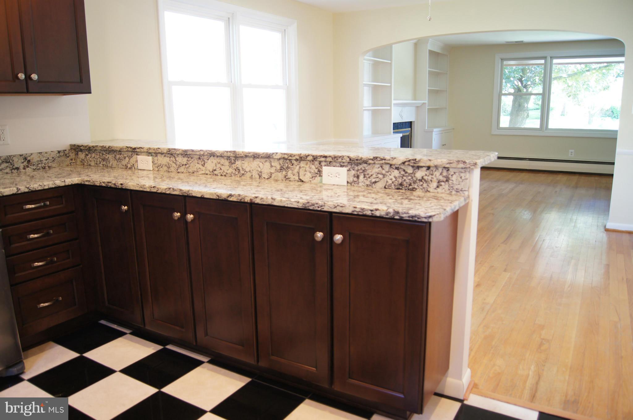 906 Rappaix Court Baltimore, MD 21286 - Photo 7 of 29 Breakfast bar overlooking dining room.