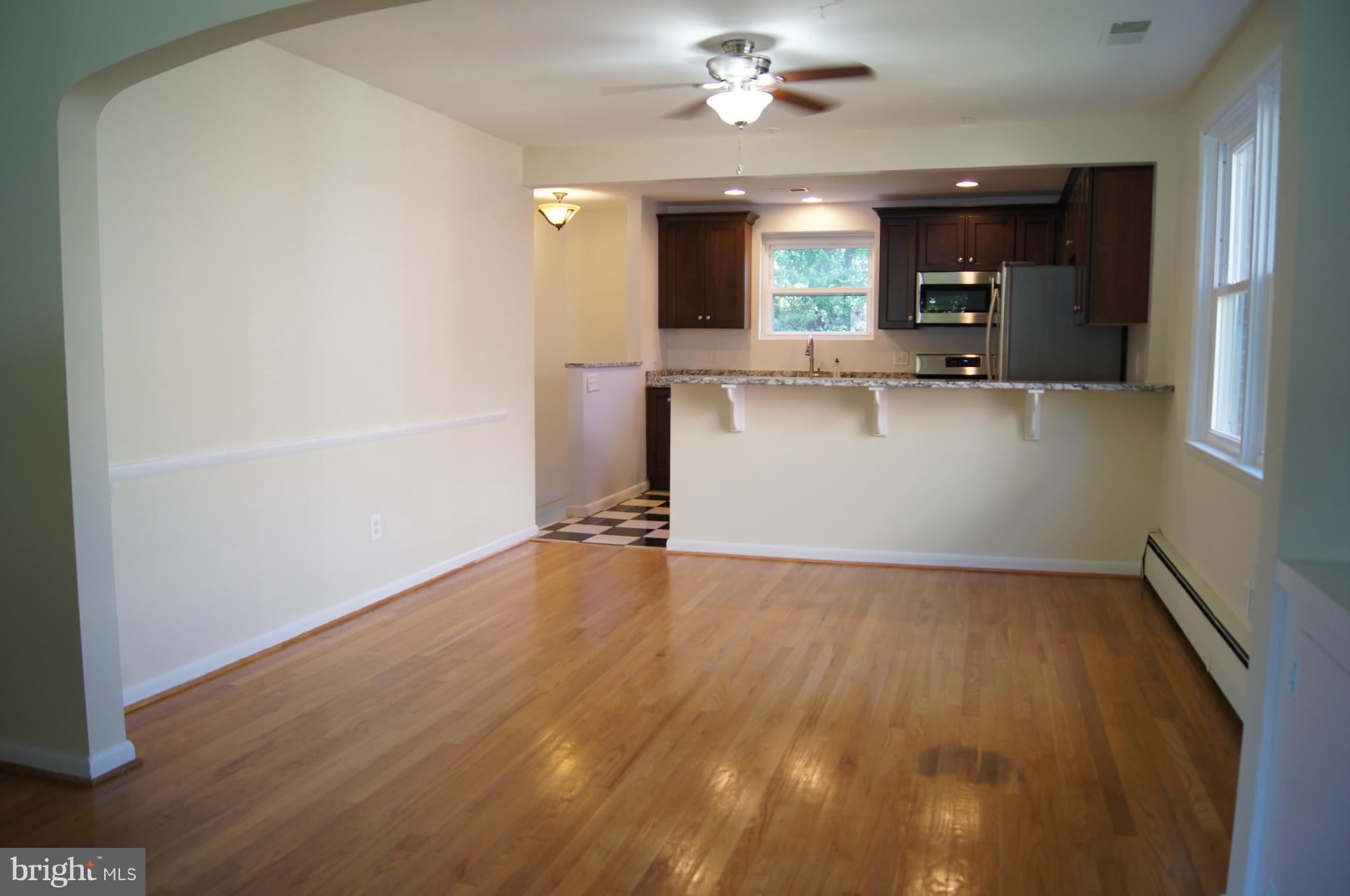906 Rappaix Court Baltimore, MD 21286 - Photo 9 of 29 Soaring archway leads to dining room from LR.