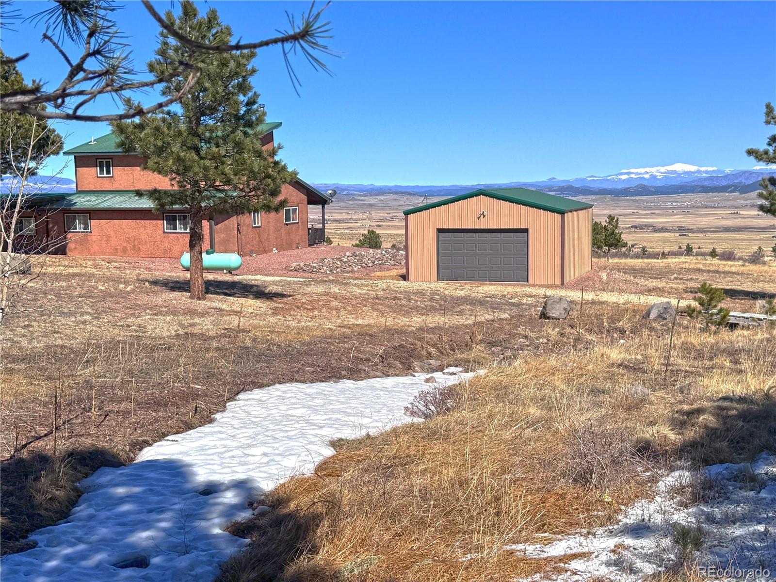 62 Rubel Road Westcliffe, CO 81252 - Photo 8 of 38 a view of a yard with a house