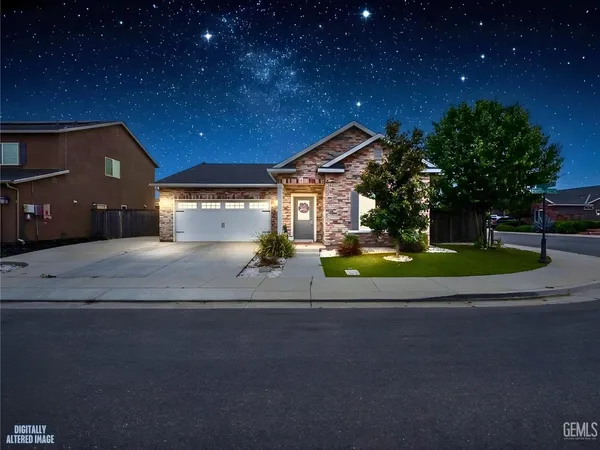 a view of a house with a street