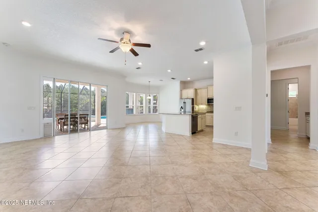 a kitchen with granite countertop a sink and a window