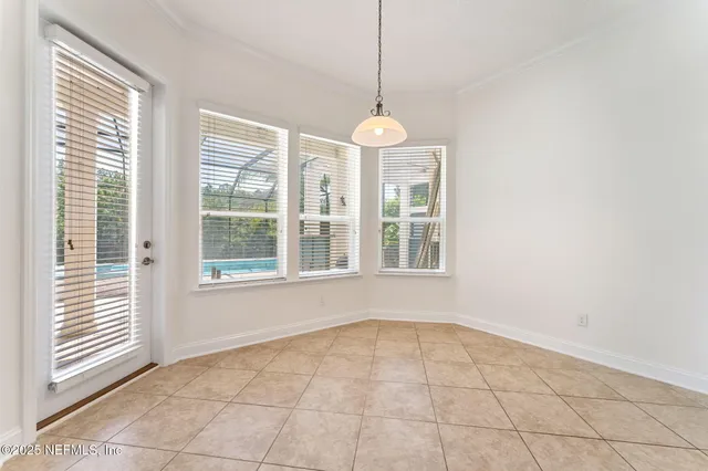 a bathroom with a granite countertop sink a toilet a mirror and bathtub