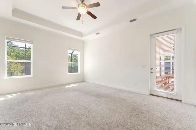 a view of a room that has a window in it