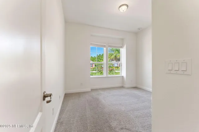 a view of a backyard with a patio