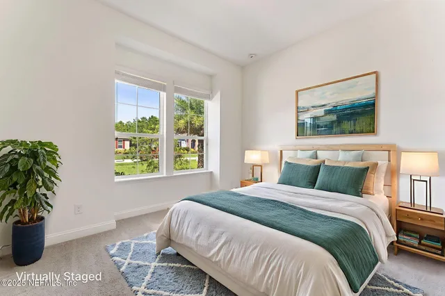 an aerial view of house with yard swimming pool and outdoor seating