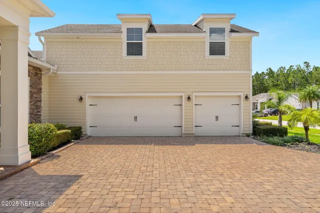 a view of a livingroom with furniture and a bathroom
