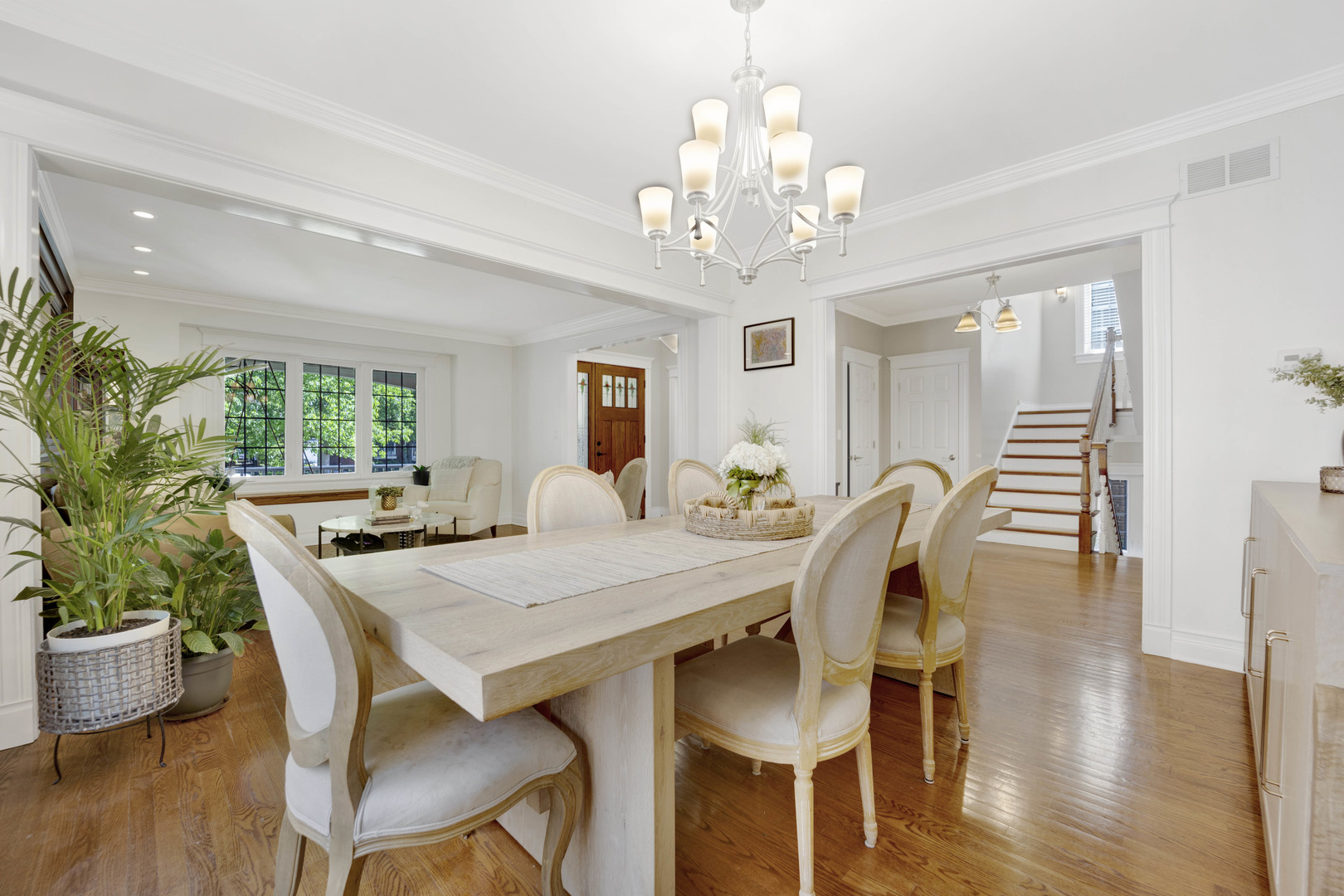 176 Lawton Road Riverside, IL 60546 - Photo 9 of 66 a view of a dining room with furniture window and wooden floor