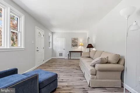 a workspace with furniture and a window