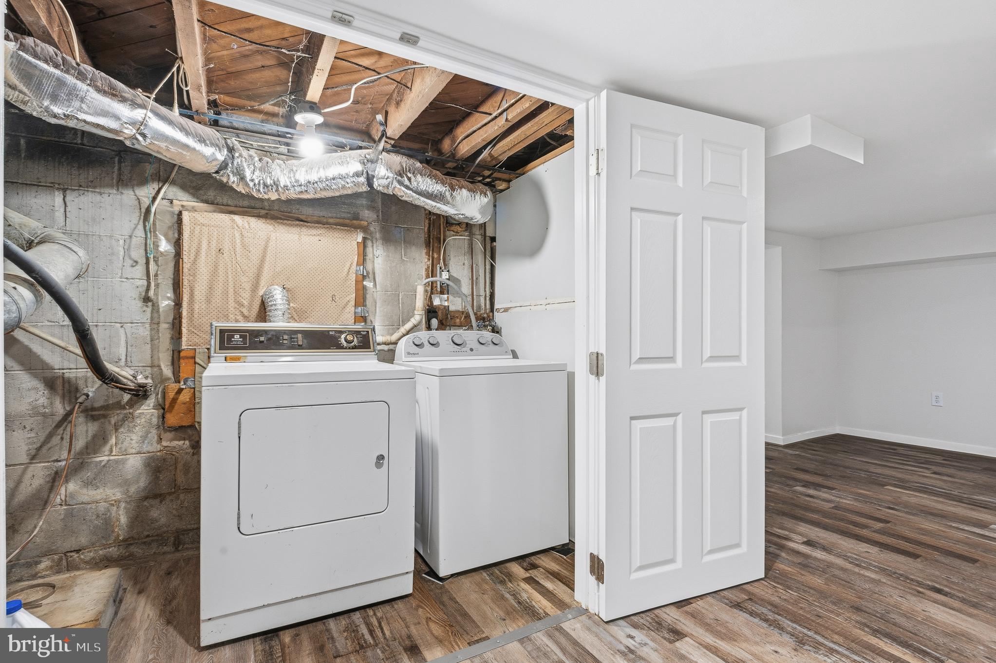 7365 Race Road Hanover, MD 21076 - Photo 16 of 68 a view of cabinets and washer dryer