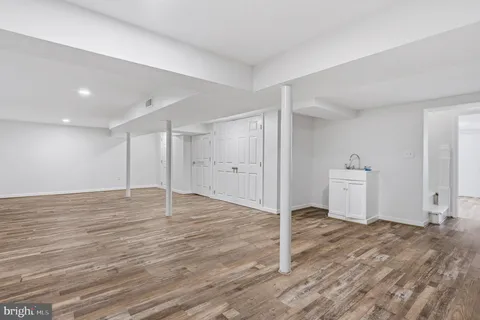 a bathroom with a tub and a shower