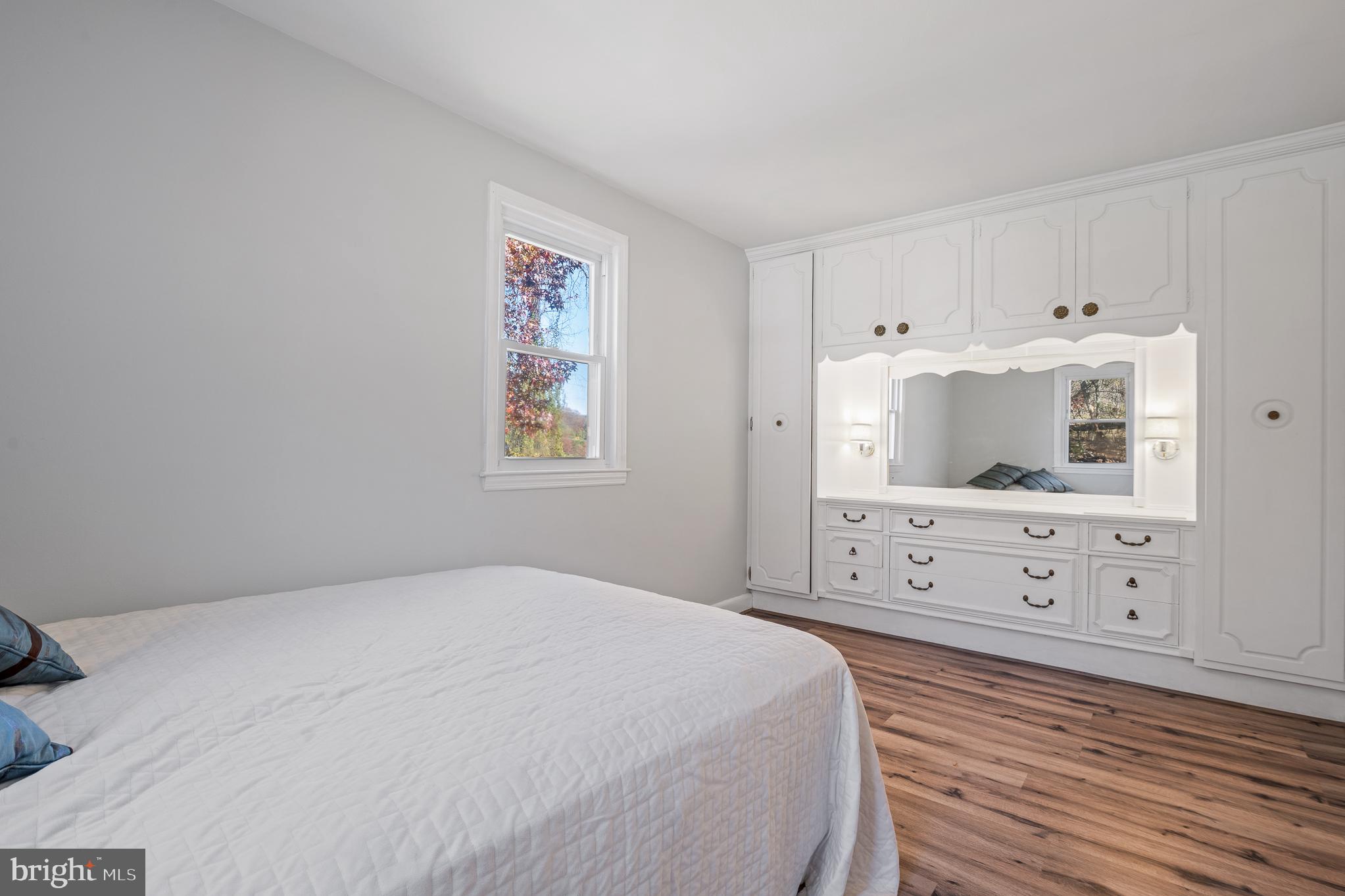 7365 Race Road Hanover, MD 21076 - Photo 32 of 68 a bedroom with a bed and a dresser