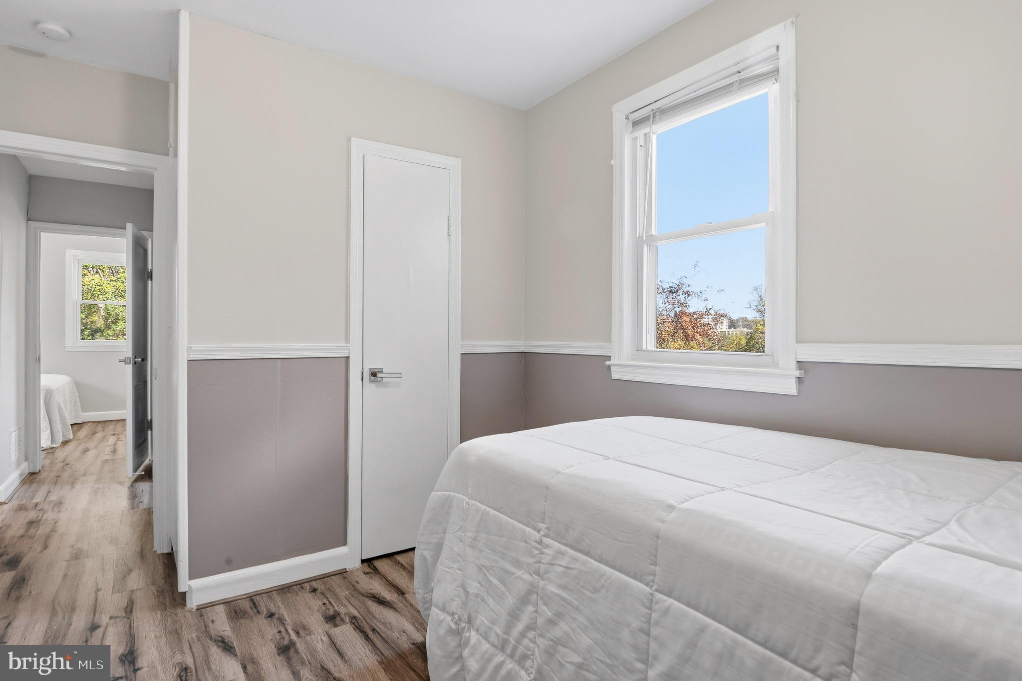 7365 Race Road Hanover, MD 21076 - Photo 38 of 68 a bedroom with a bed and a painting on the wall