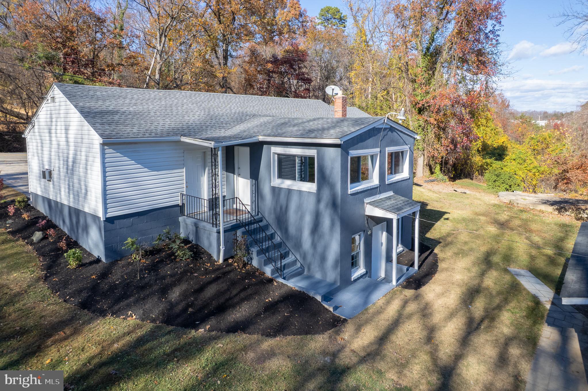 7365 Race Road Hanover, MD 21076 - Photo 51 of 68 a view of a house with a yard and large trees