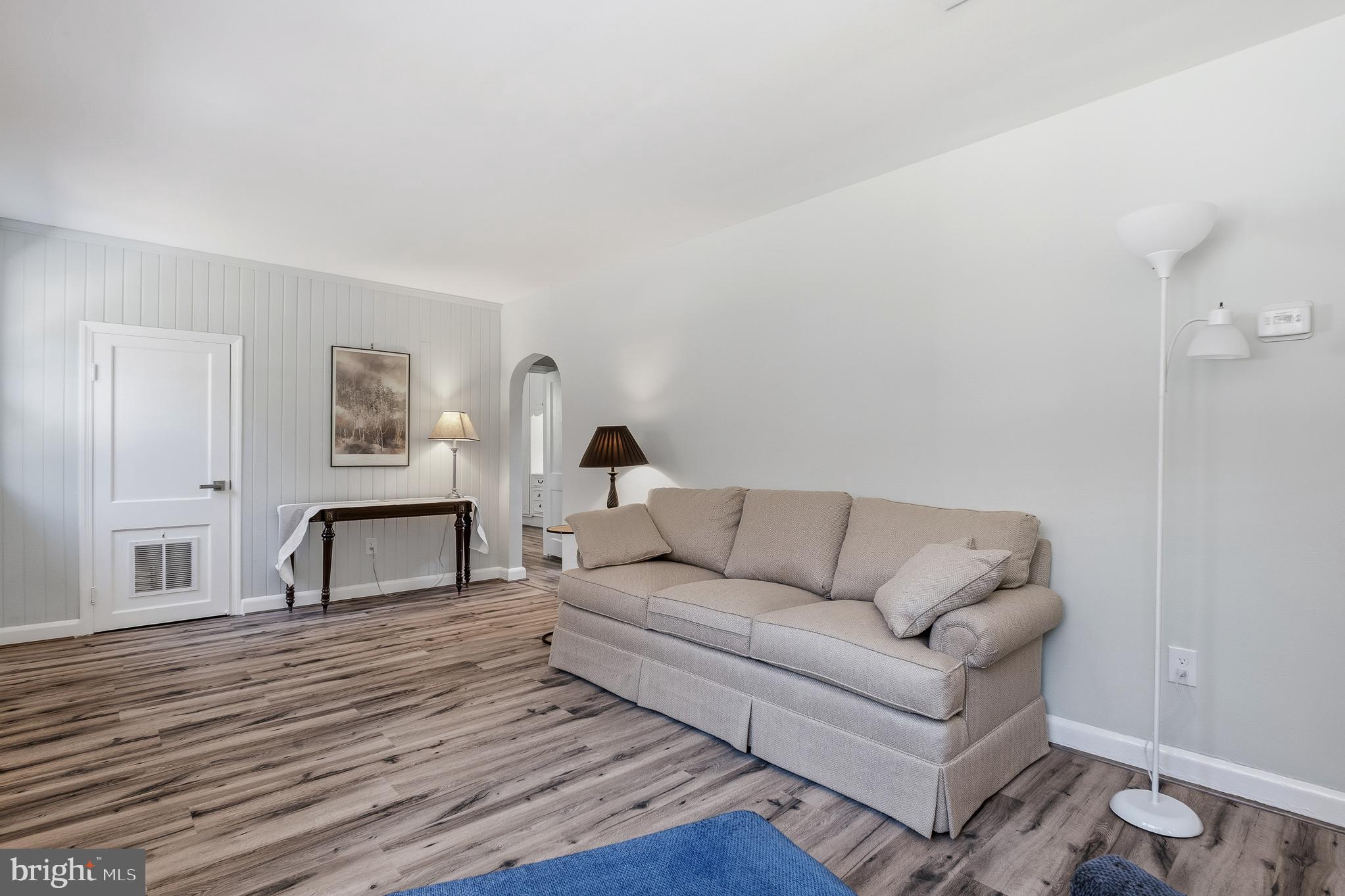 7365 Race Road Hanover, MD 21076 - Photo 9 of 68 a living room with furniture and a wooden floor