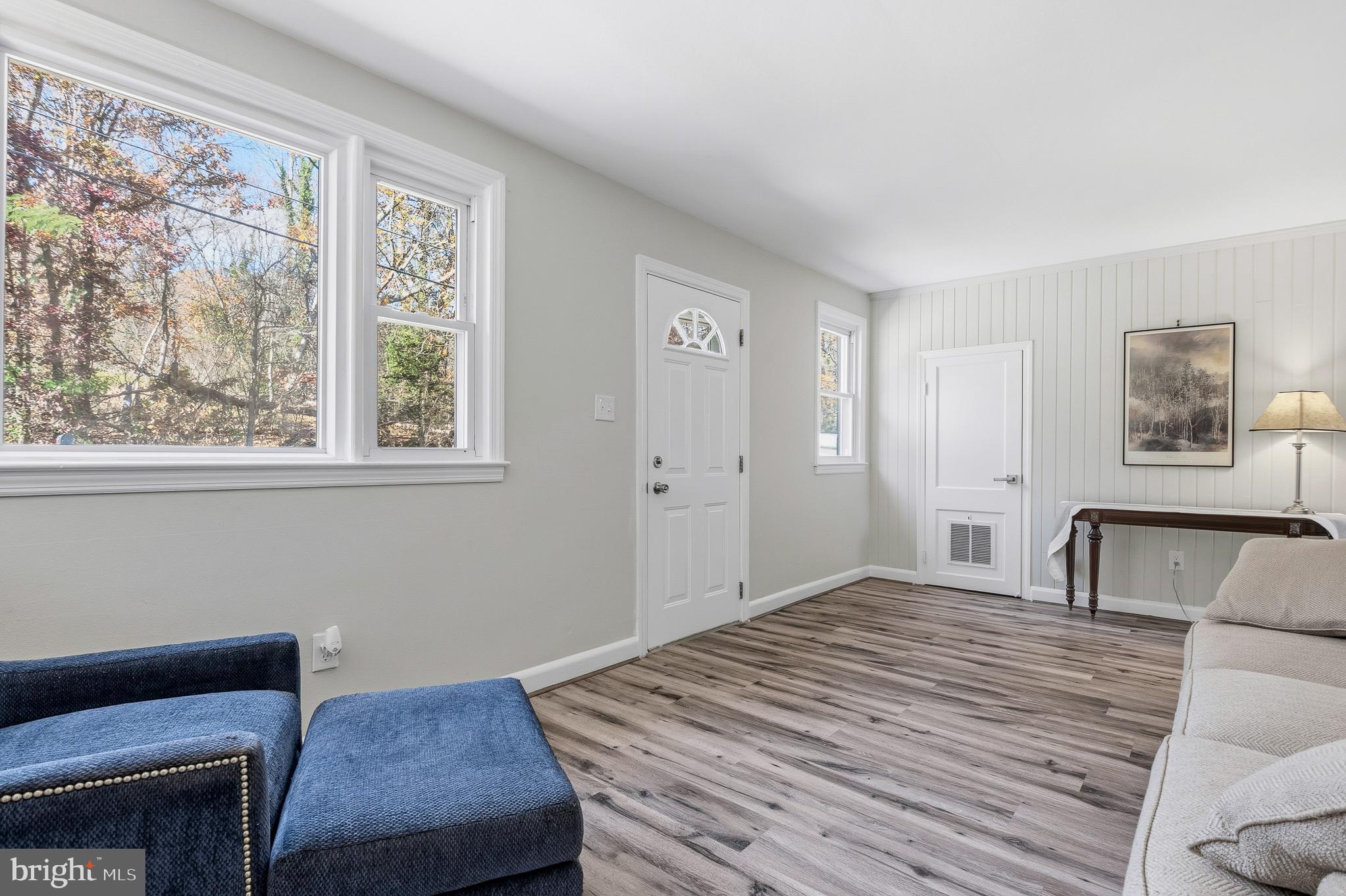 7365 Race Road Hanover, MD 21076 - Photo 10 of 68 a bedroom with a bed and a window with chair