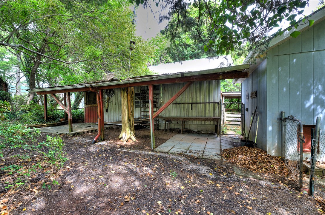 5064 Keowee School Road Seneca, SC 29672 - Photo 49 of 49 This property features an outbuilding with a sheltered area, perfect for various activities.