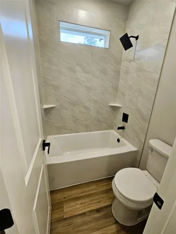 a bathroom with a mirror and a sink