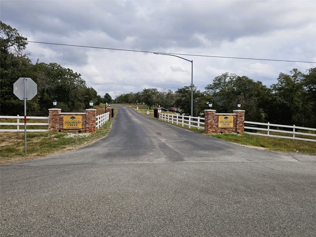 116 Pine Point Cove Elgin, TX 78621 - Photo 28 of 31 a view of a swimming pool with a bench in the patio