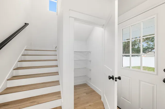 a view of entryway with white walls and windows