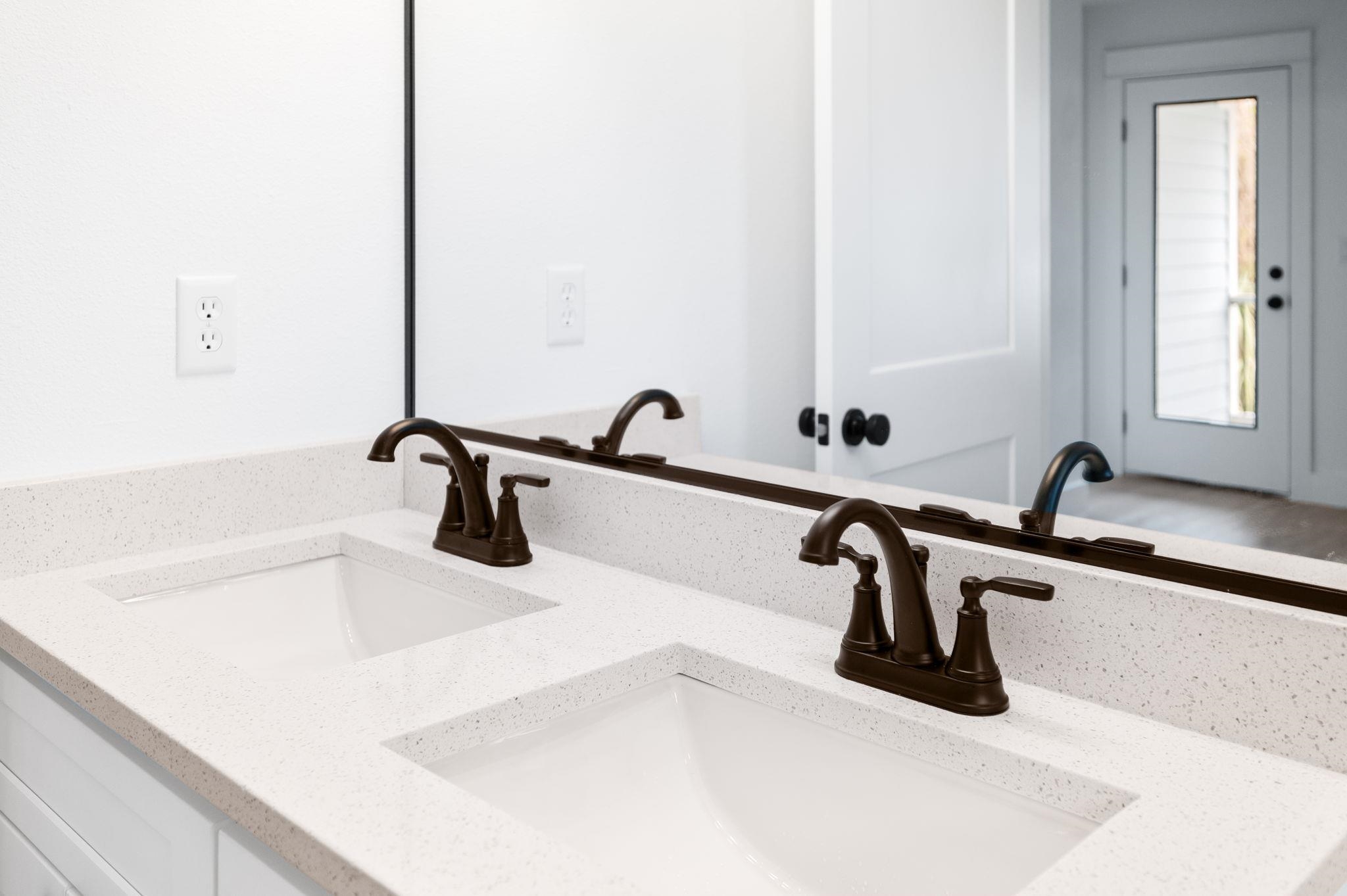 863 West 12th Street St. Augustine, FL 32084 - Photo 31 of 41 a bathroom with a sink and a bathtub
