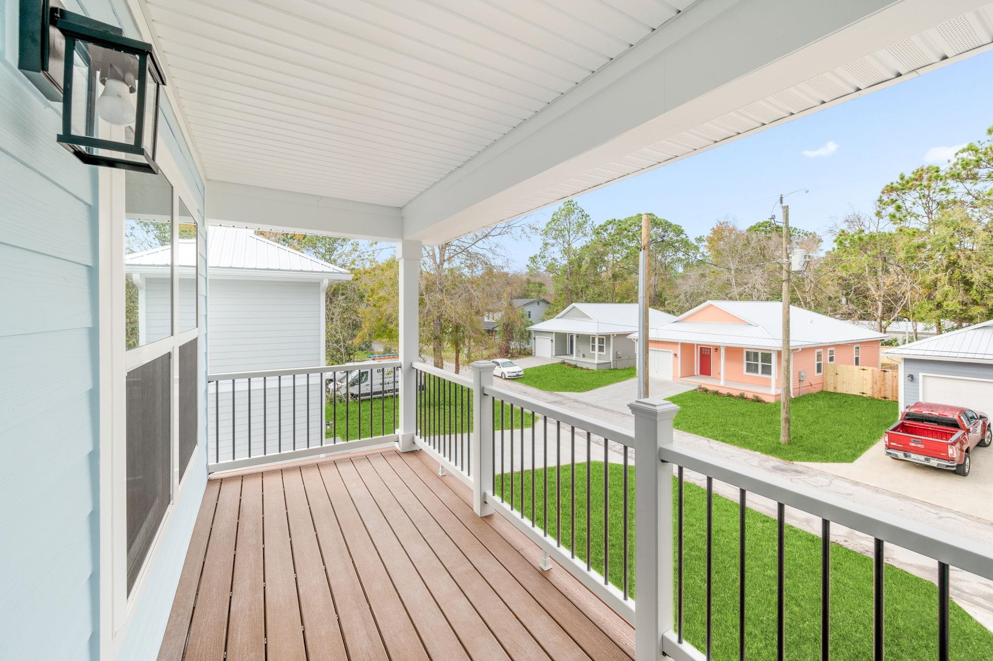 863 West 12th Street St. Augustine, FL 32084 - Photo 32 of 41 a view of a balcony with yard