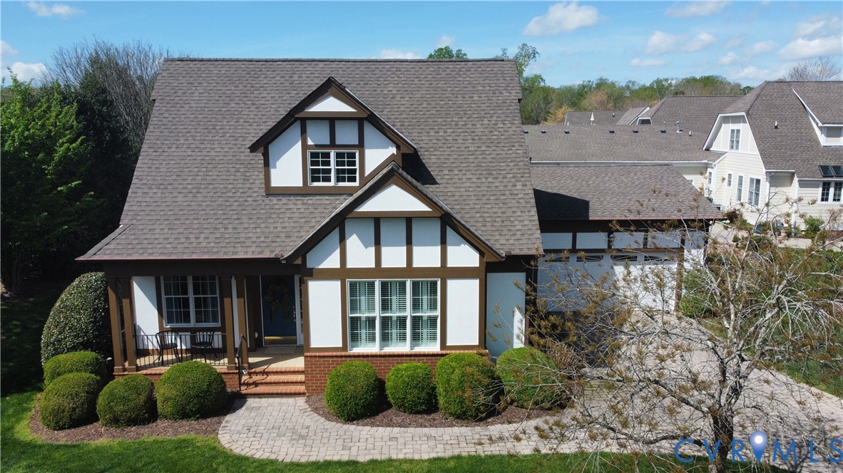 9012 Amberhill Loop North Chesterfield, VA 23236 - Photo 2 of 30 a front view of a house with a yard