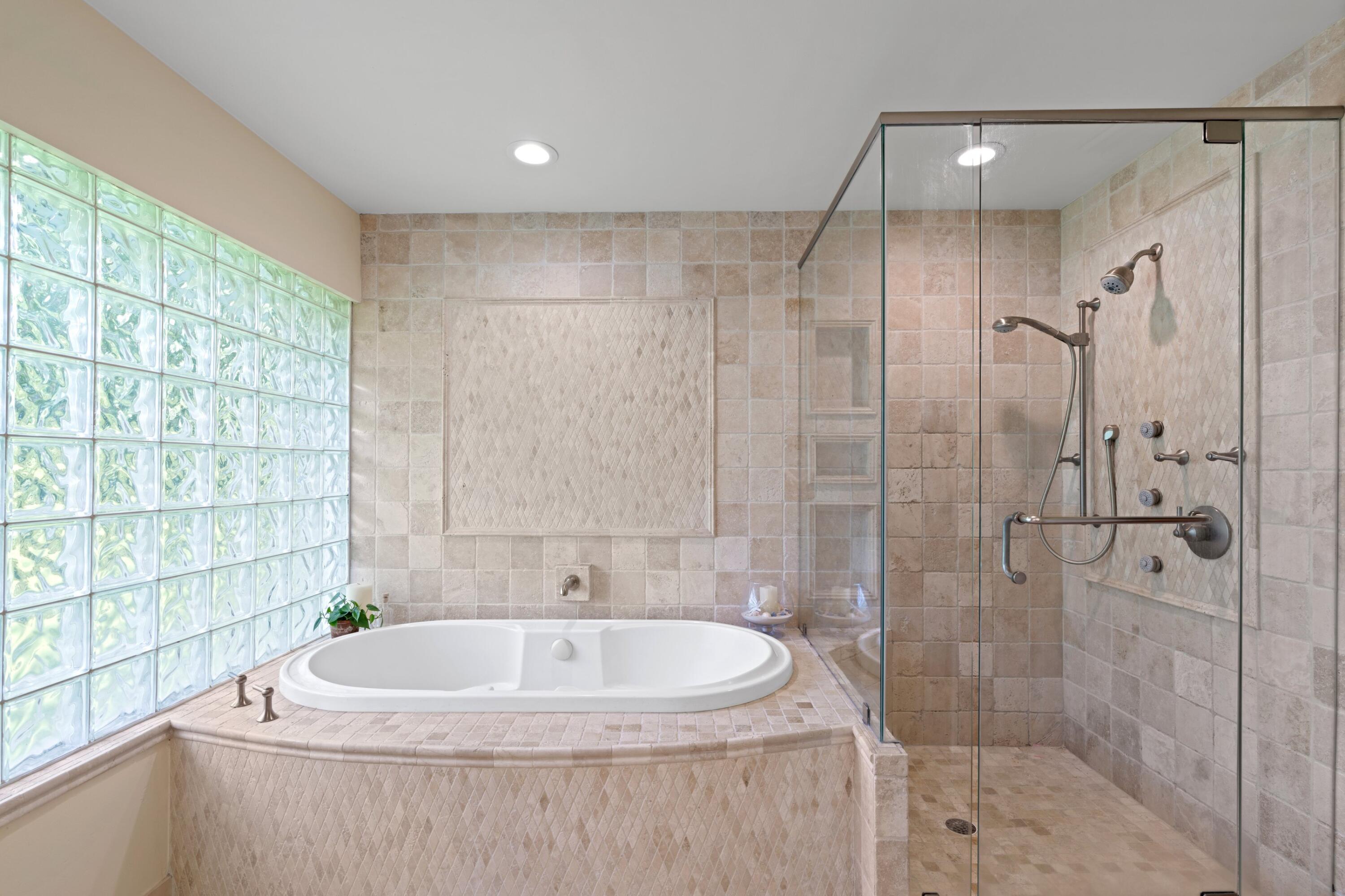 10238 Crosswind Road Boca Raton, FL 33498 - Photo 19 of 42 a bathroom with a sink and a shower