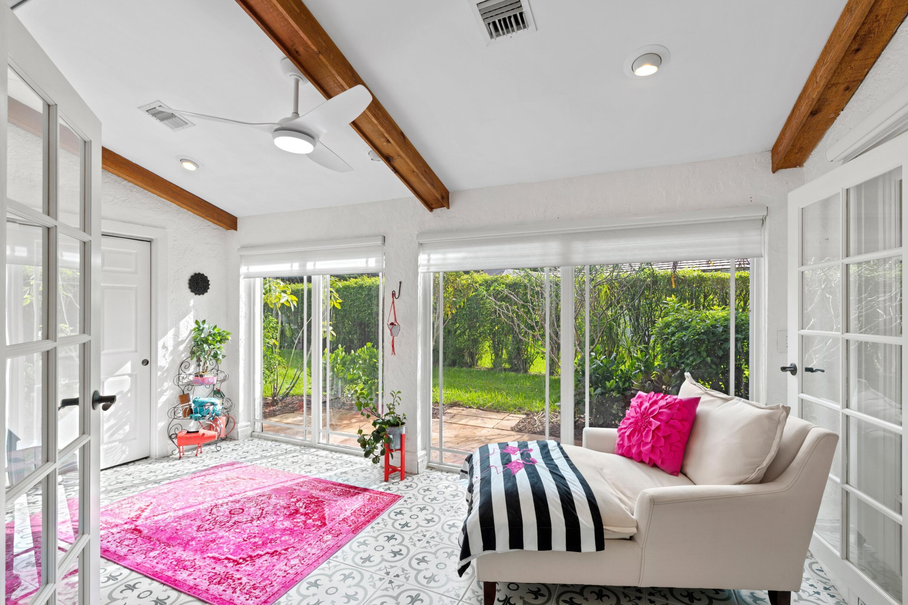 10238 Crosswind Road Boca Raton, FL 33498 - Photo 23 of 42 a living room with furniture and a large window