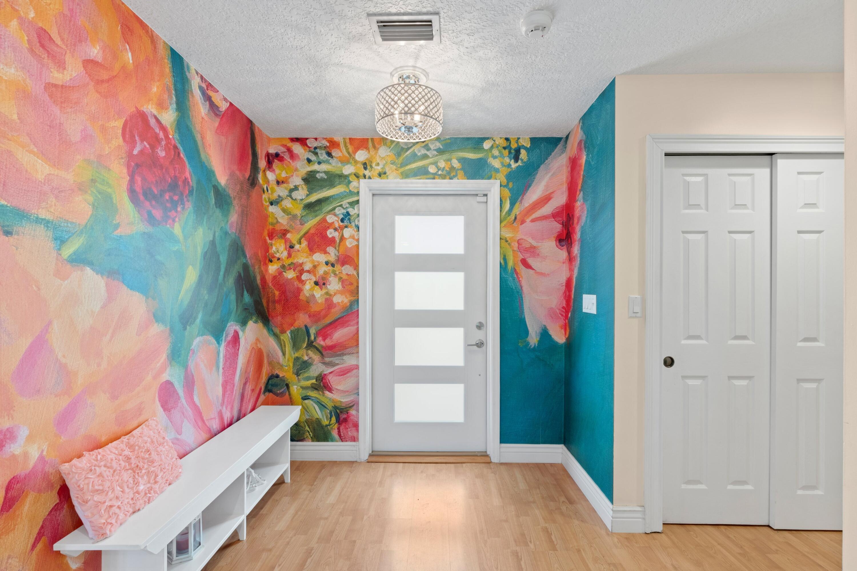 10238 Crosswind Road Boca Raton, FL 33498 - Photo 4 of 42 a view of entryway with wooden floor