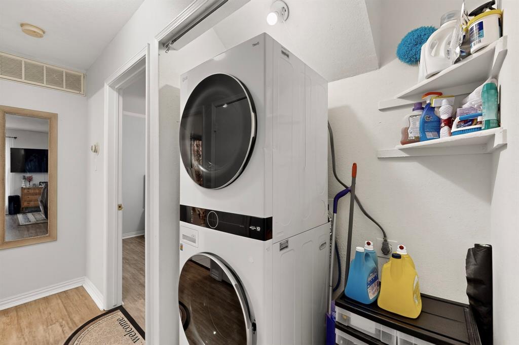 324 West Harwood Road, Unit A Hurst, TX 76054 - Photo 27 of 27 a utility room with dryer and washer