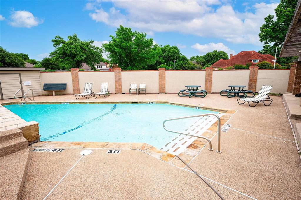 324 West Harwood Road, Unit A Hurst, TX 76054 - Photo 3 of 27 an aerial view of a house with patio swimming pool and outdoor seating