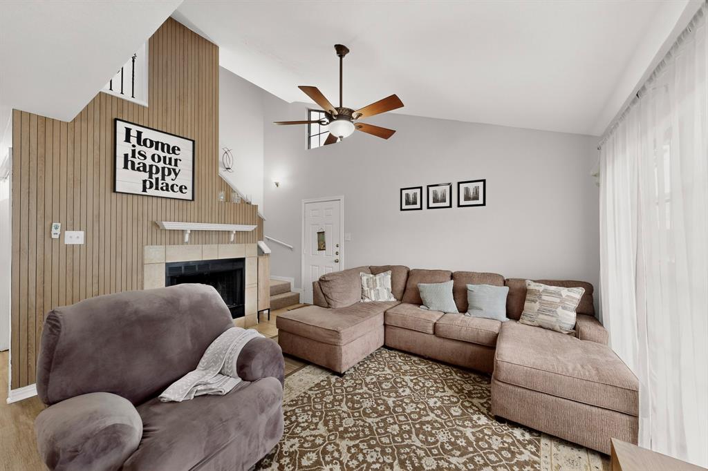 324 West Harwood Road, Unit A Hurst, TX 76054 - Photo 7 of 27 a living room with furniture fireplace and a window