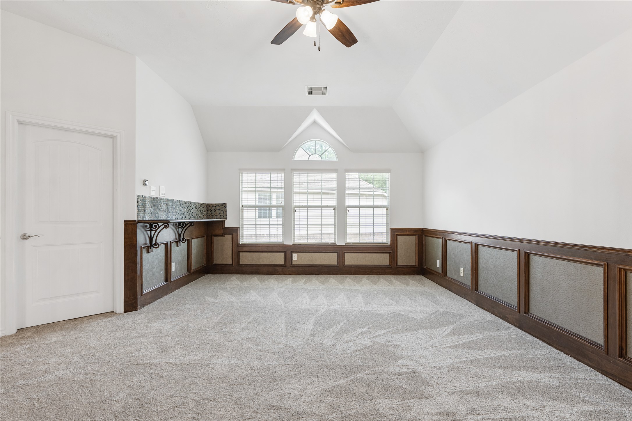 2115 Graystone Ridge Drive Conroe, TX 77304 - Photo 28 of 47 You will love this spacious game room, offering the perfect setting for entertainment, relaxation, and family fun.