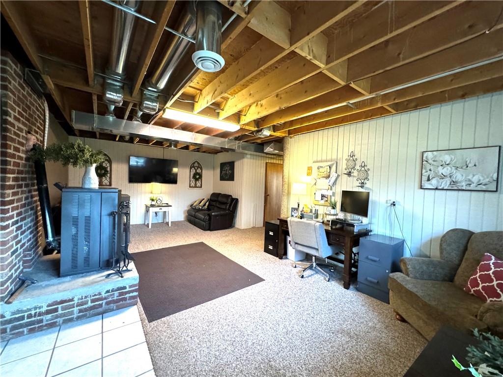 370 Braddock Road Farmington, PA 15437 - Photo 26 of 46 a living room with furniture and a view of kitchen