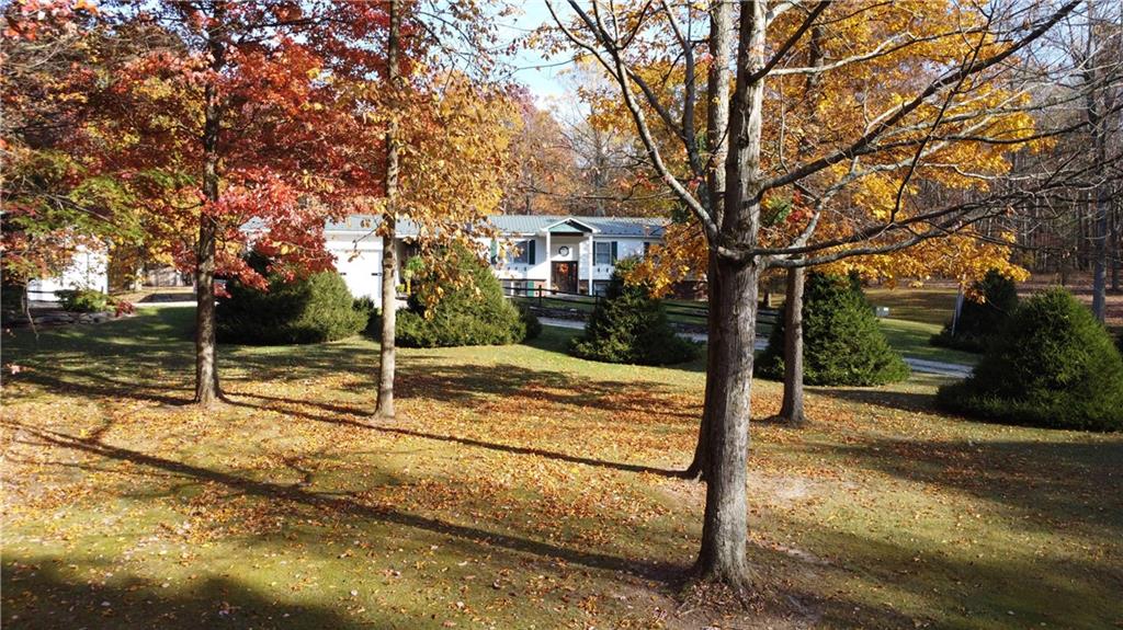370 Braddock Road Farmington, PA 15437 - Photo 27 of 46 a view of a house with backyard