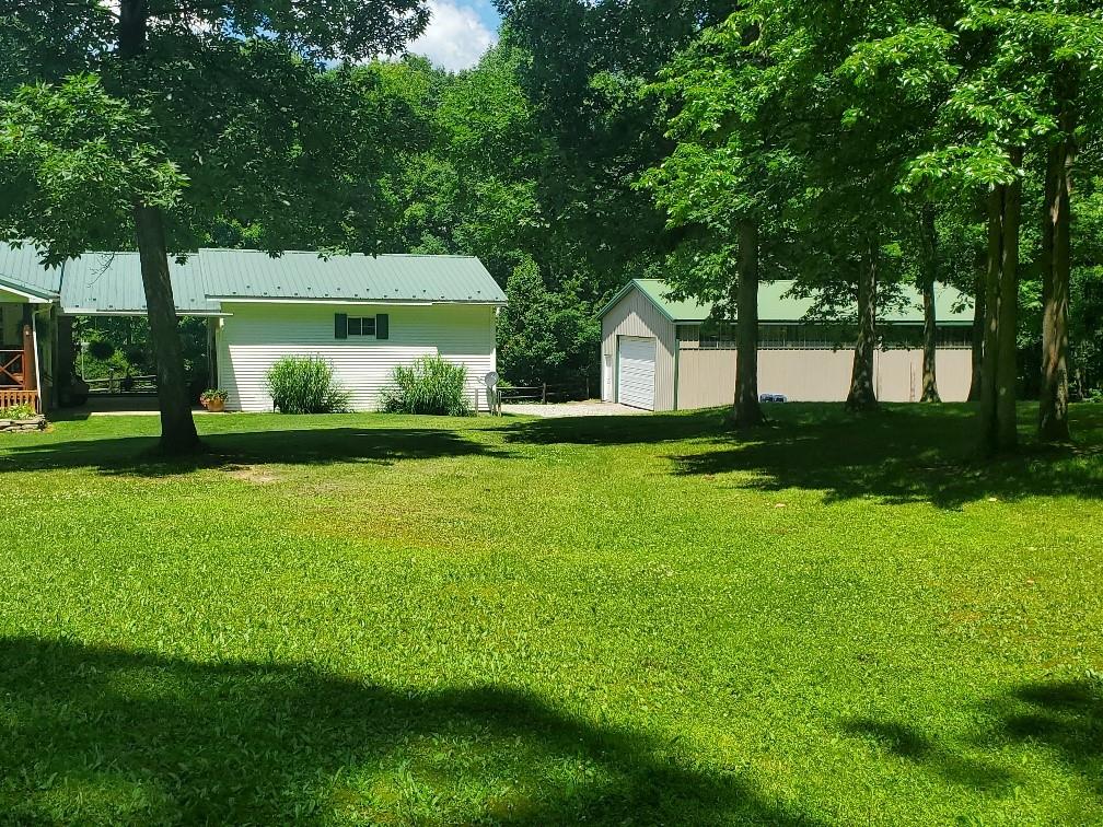 370 Braddock Road Farmington, PA 15437 - Photo 39 of 46 a view of house with a yard