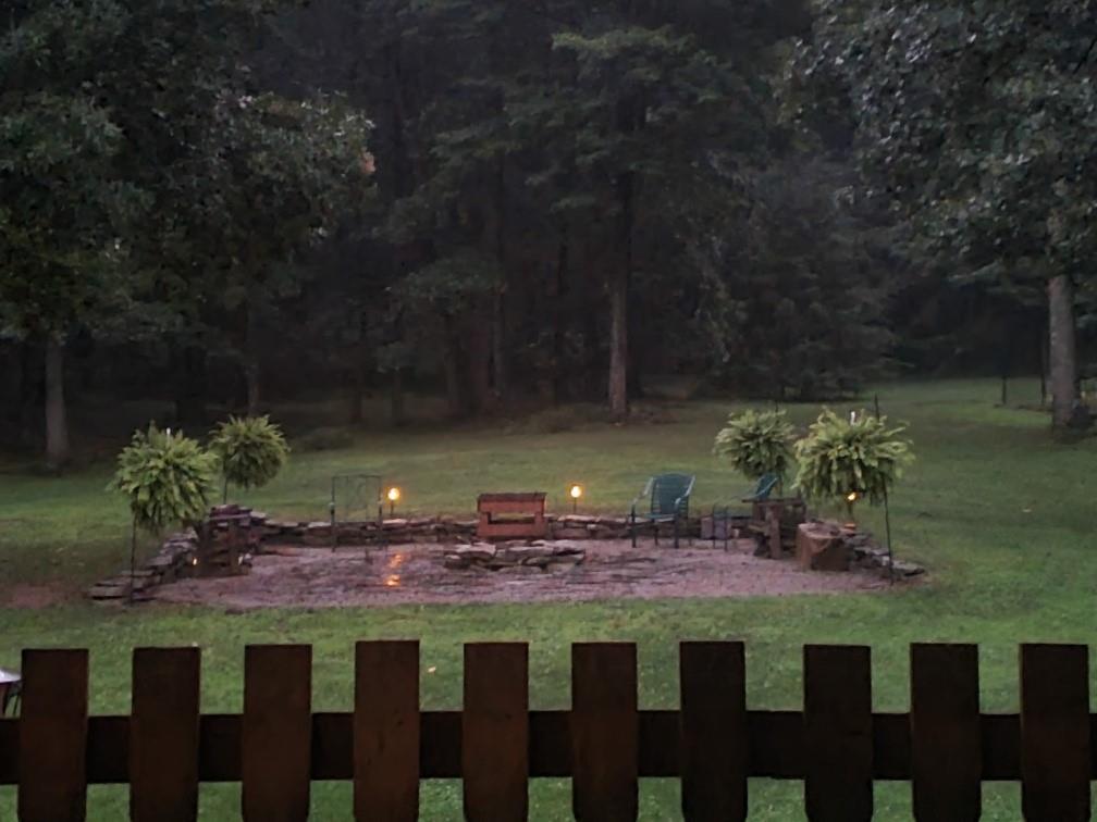 370 Braddock Road Farmington, PA 15437 - Photo 4 of 46 a view of a wooden floor with a yard