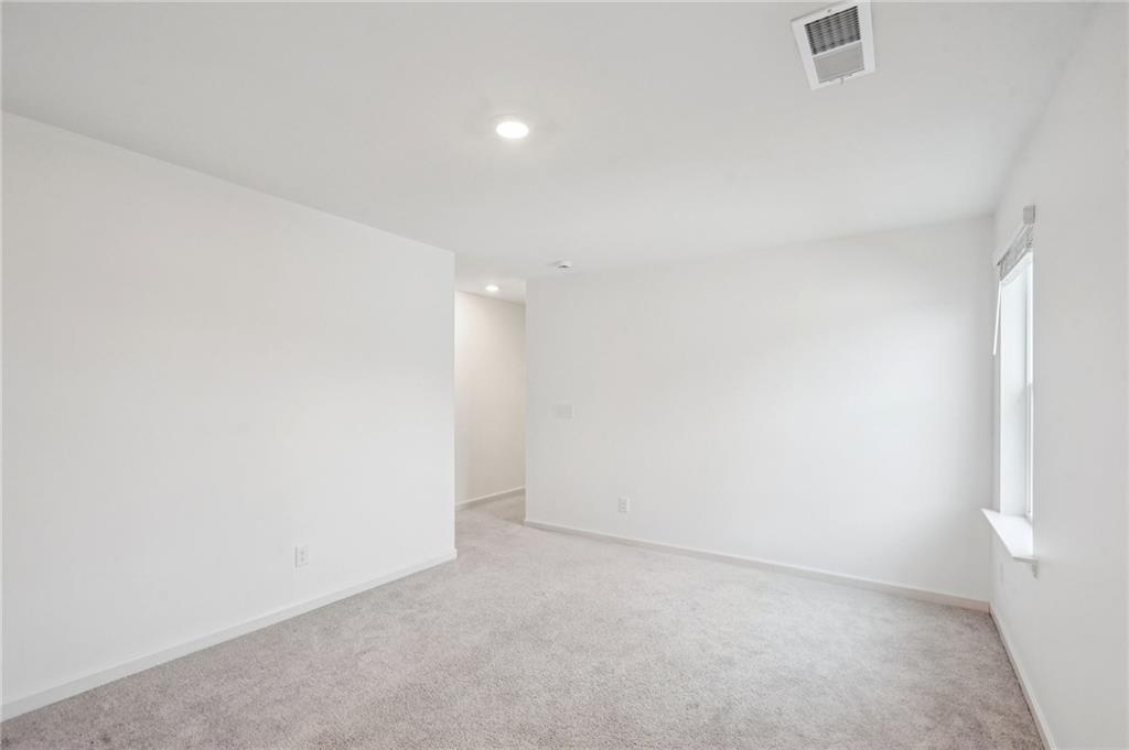 3853 Rustic Barn Way Loganville, GA 30052 - Photo 15 of 22 a view of empty room