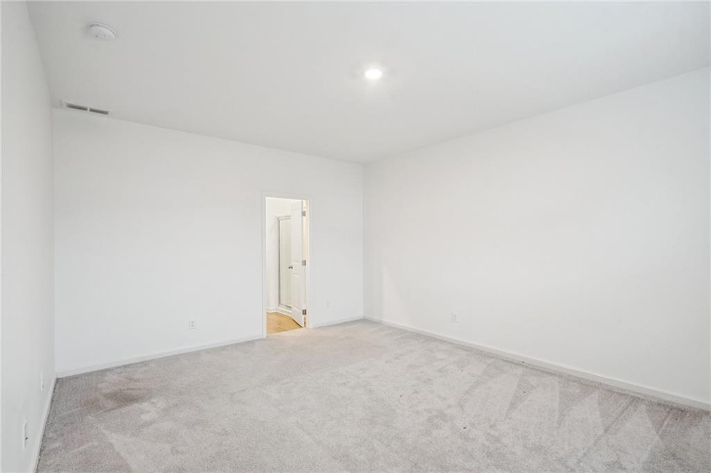 3853 Rustic Barn Way Loganville, GA 30052 - Photo 10 of 22 a view of an empty room