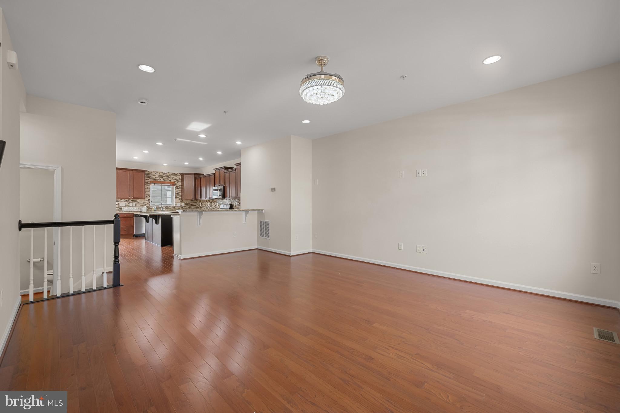 7997 Alchemy Way Elkridge, MD 21075 - Photo 13 of 43 Living Room View into Kitchen