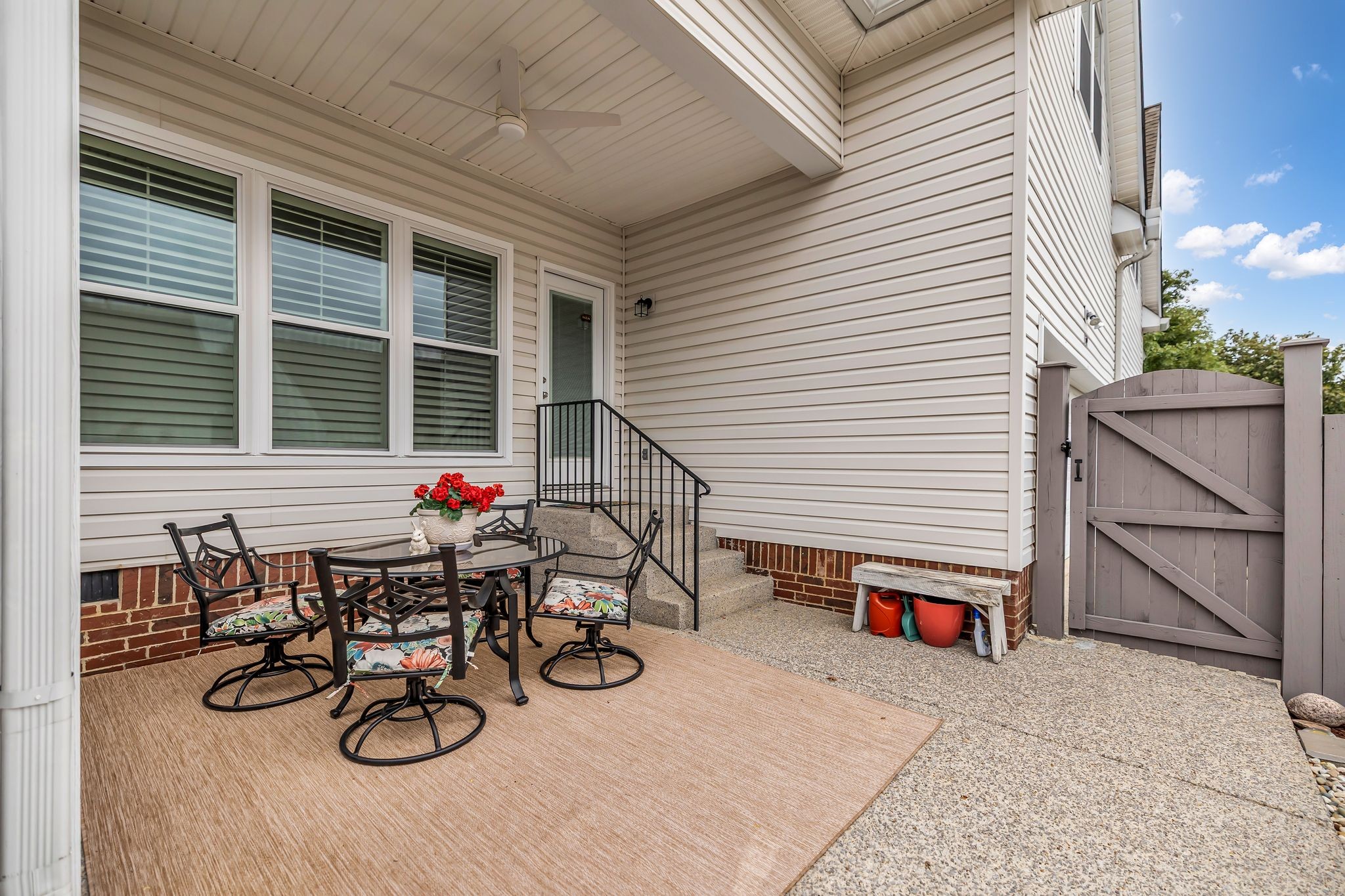 1509 Decatur Circle Franklin, TN 37067 - Photo 33 of 40 a view of a patio with wooden table and chairs
