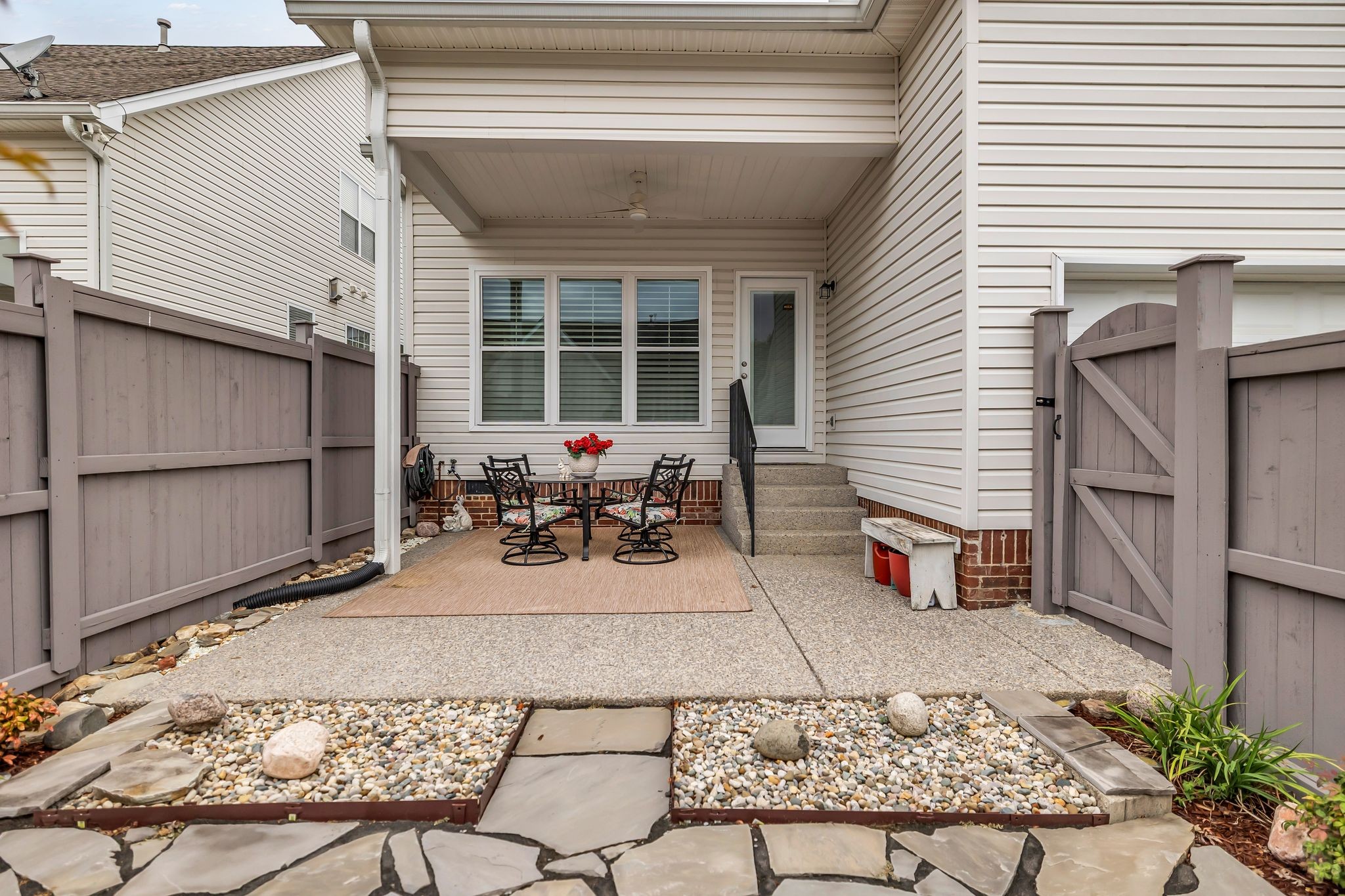 1509 Decatur Circle Franklin, TN 37067 - Photo 35 of 40 a view of a patio with table and chairs with wooden floor and fence